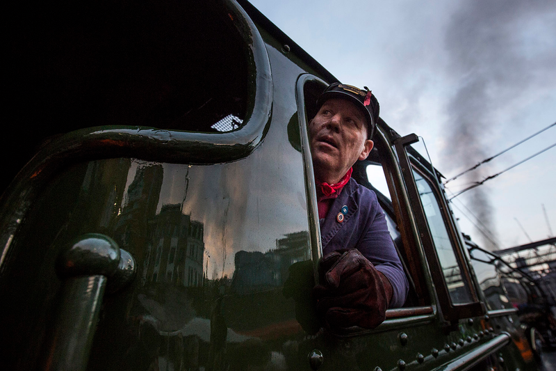 A train driver looks out of the window of The Flying Scotsman as it leaves Kings Cross Station on February 25, 2016 in London, England. (Photo by Dan Kitwood/Getty Images)